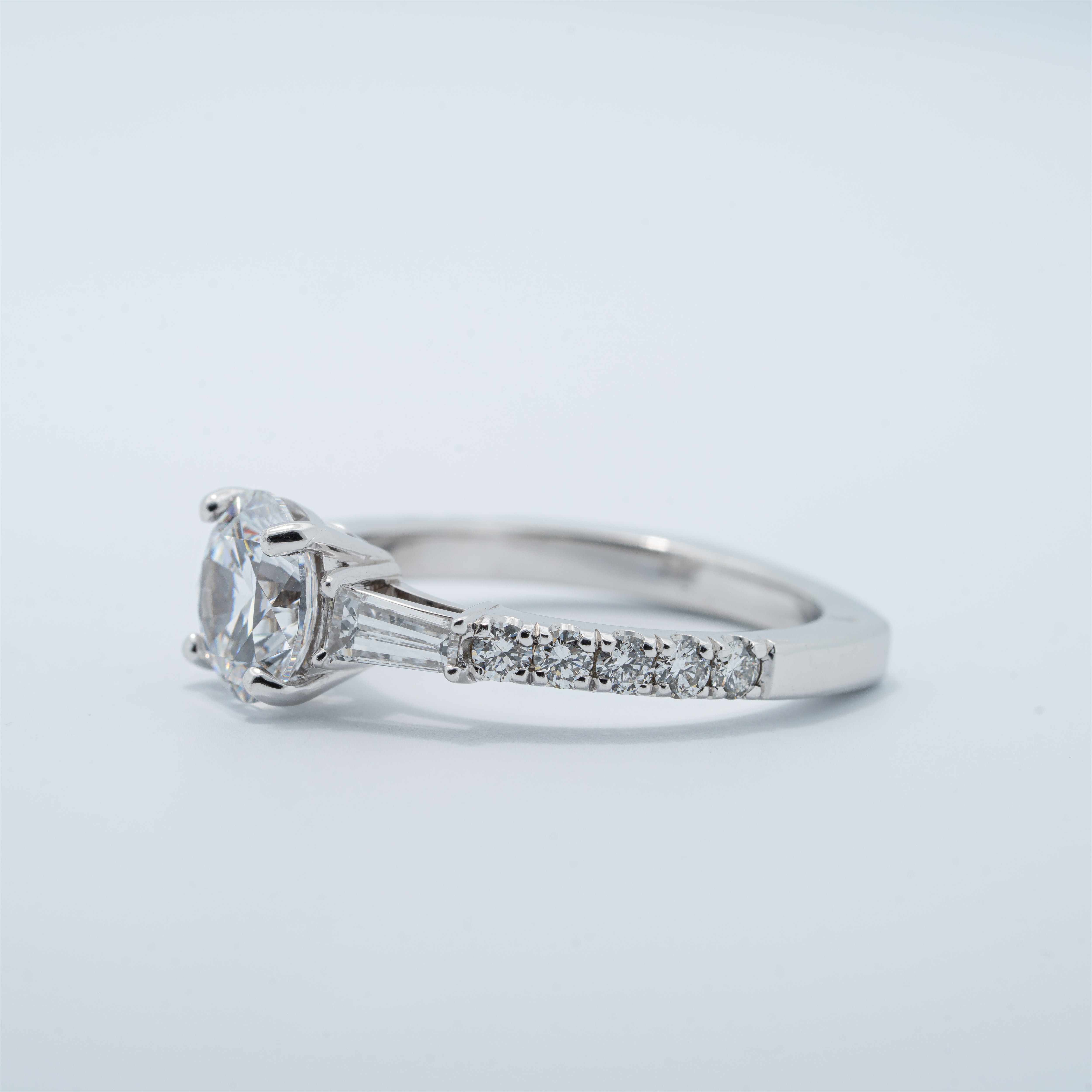 Classic Style Baguette Accented Engagement Ring