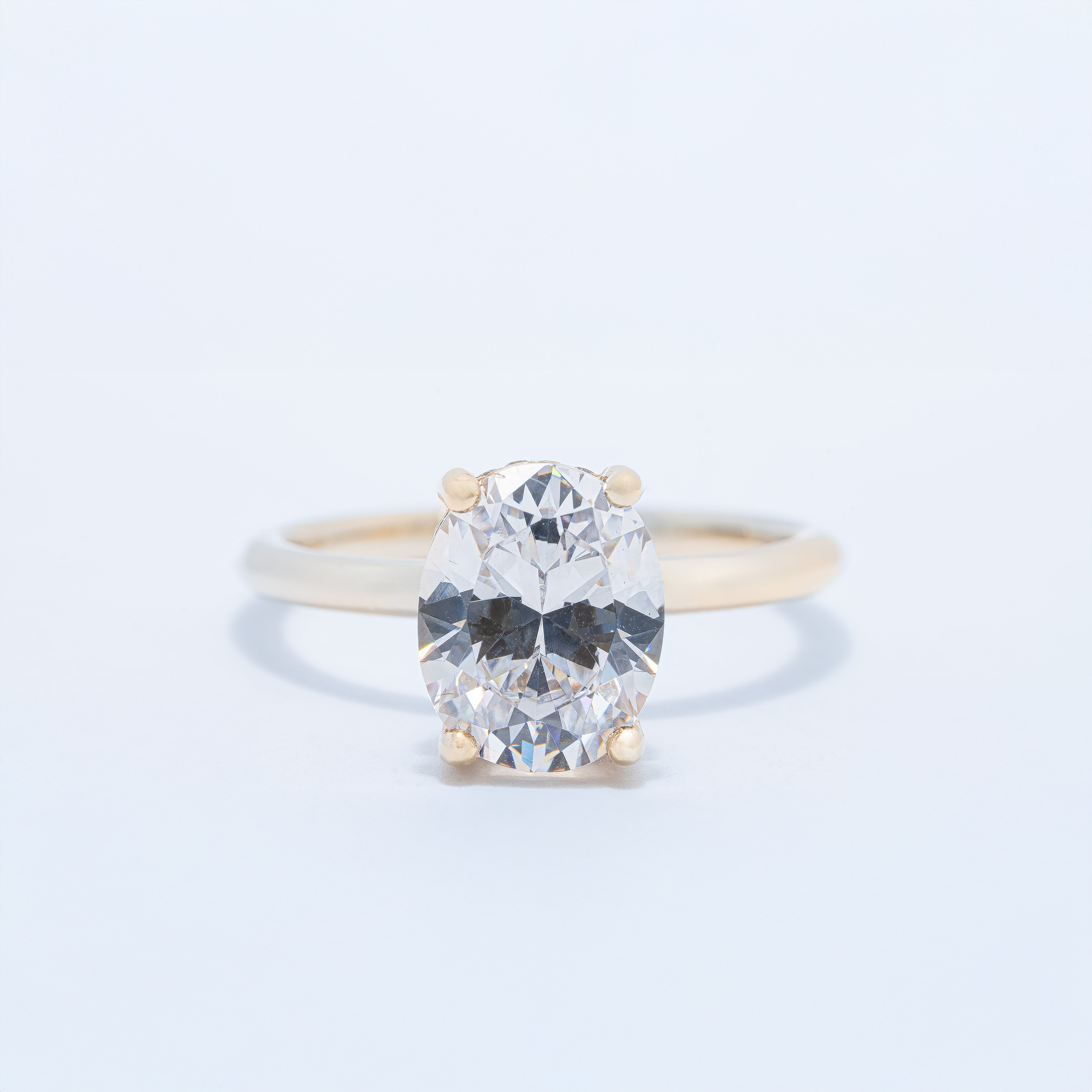 Hidden Halo Oval Engagement Ring