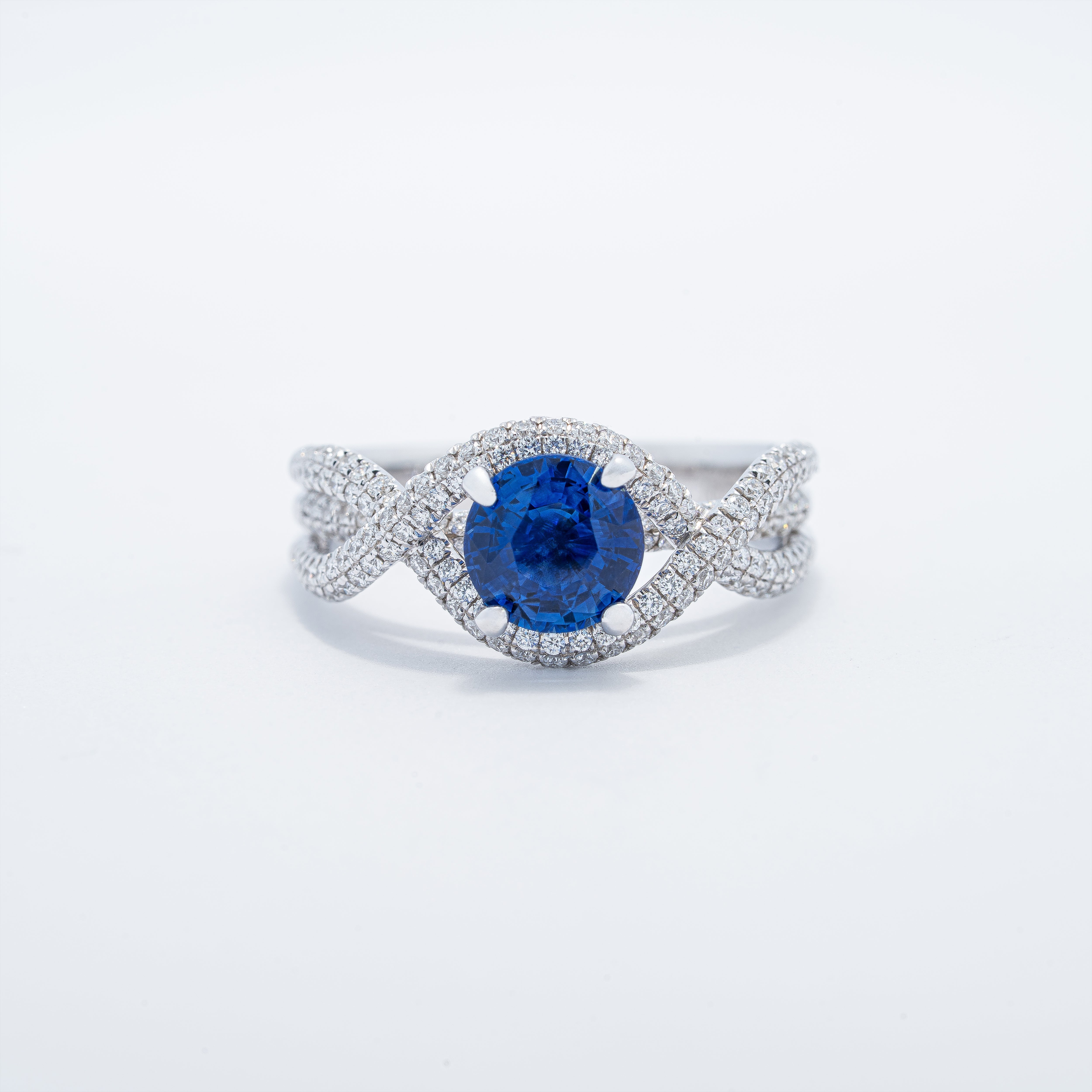 Modern Crossover Style Sapphire Ring
