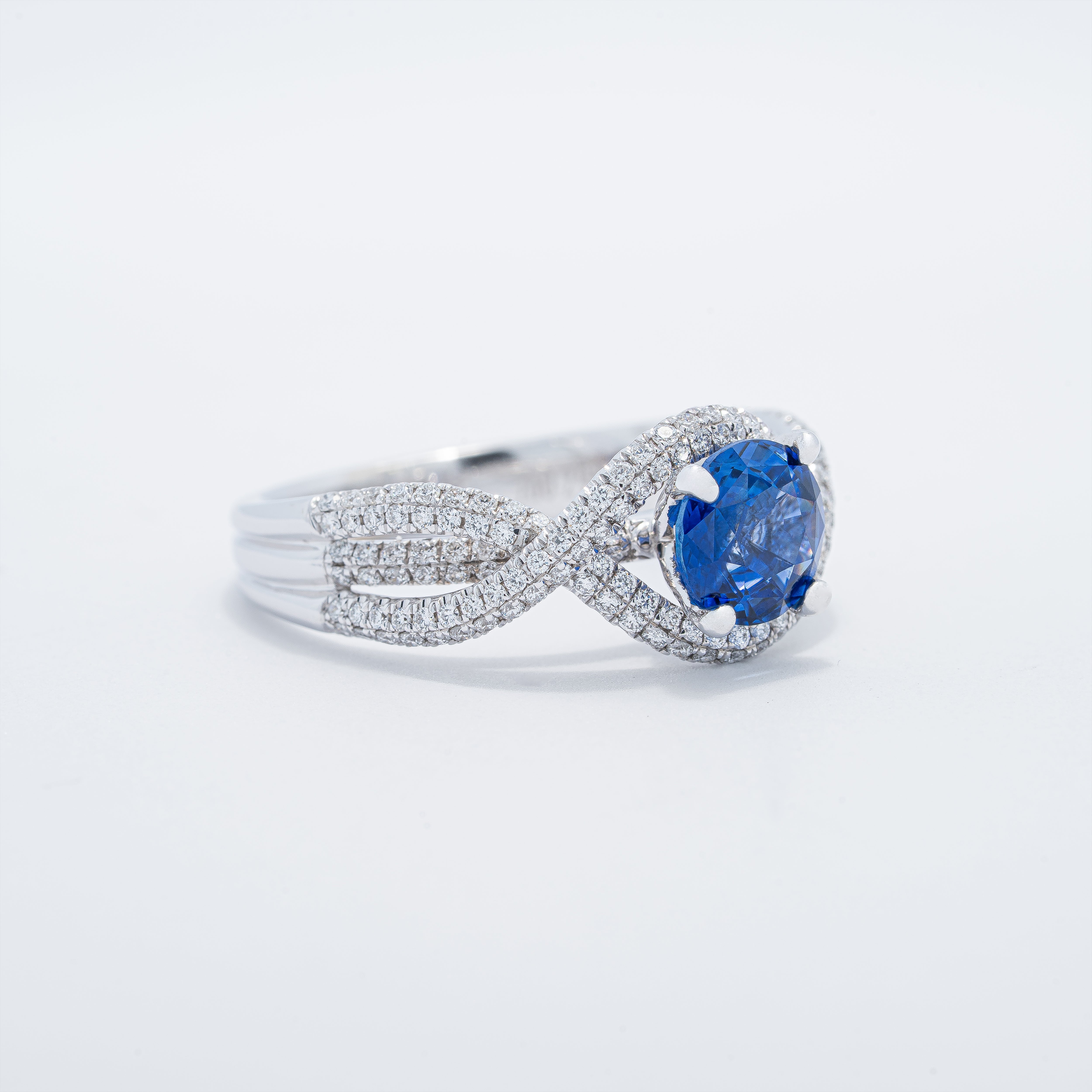 Modern Crossover Style Sapphire Ring
