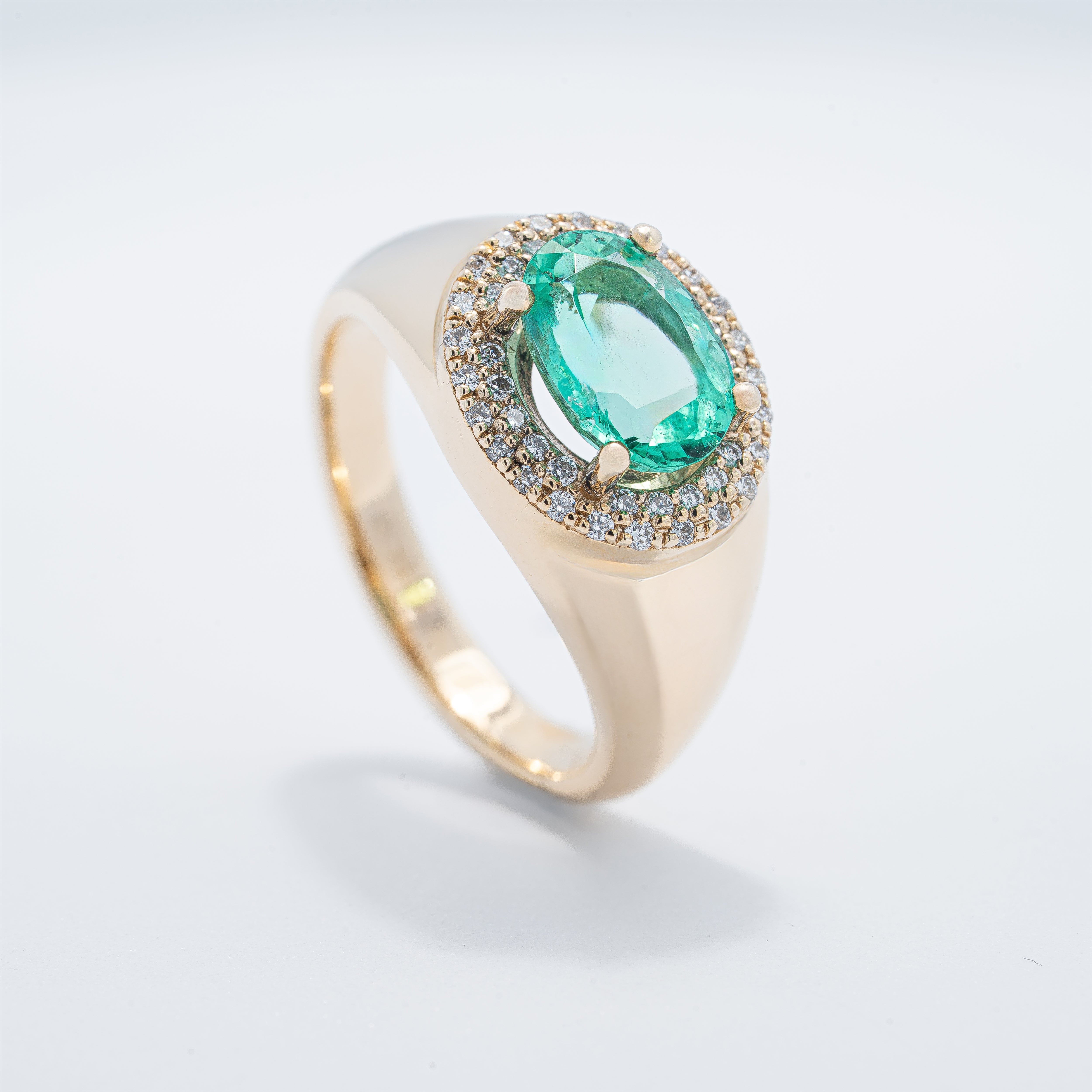 Oval Double Halo Emerald & Diamond Ring