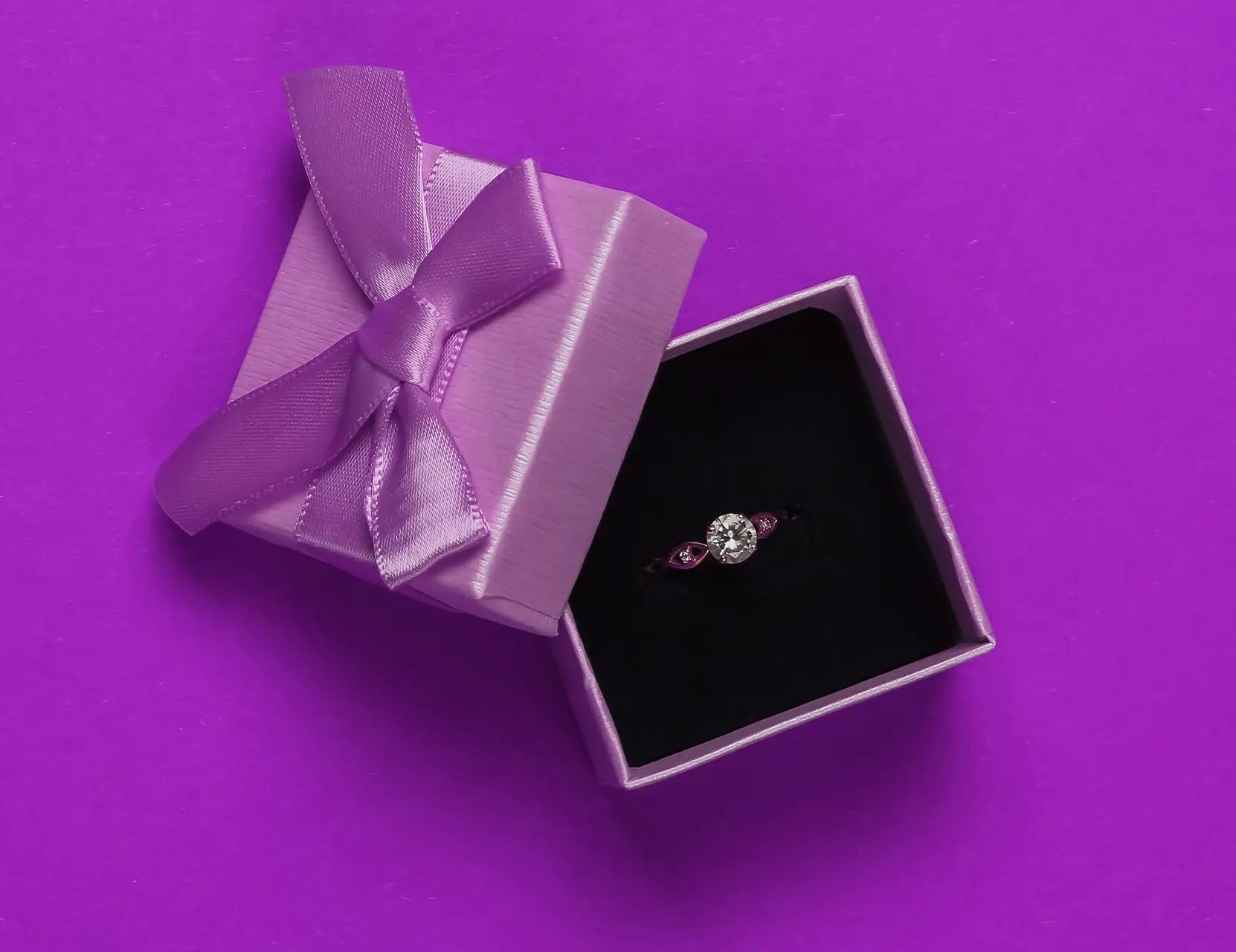 Diamond ring inside purple gift box from Joe Kassab Jewelers in Happy Valley, Oregon