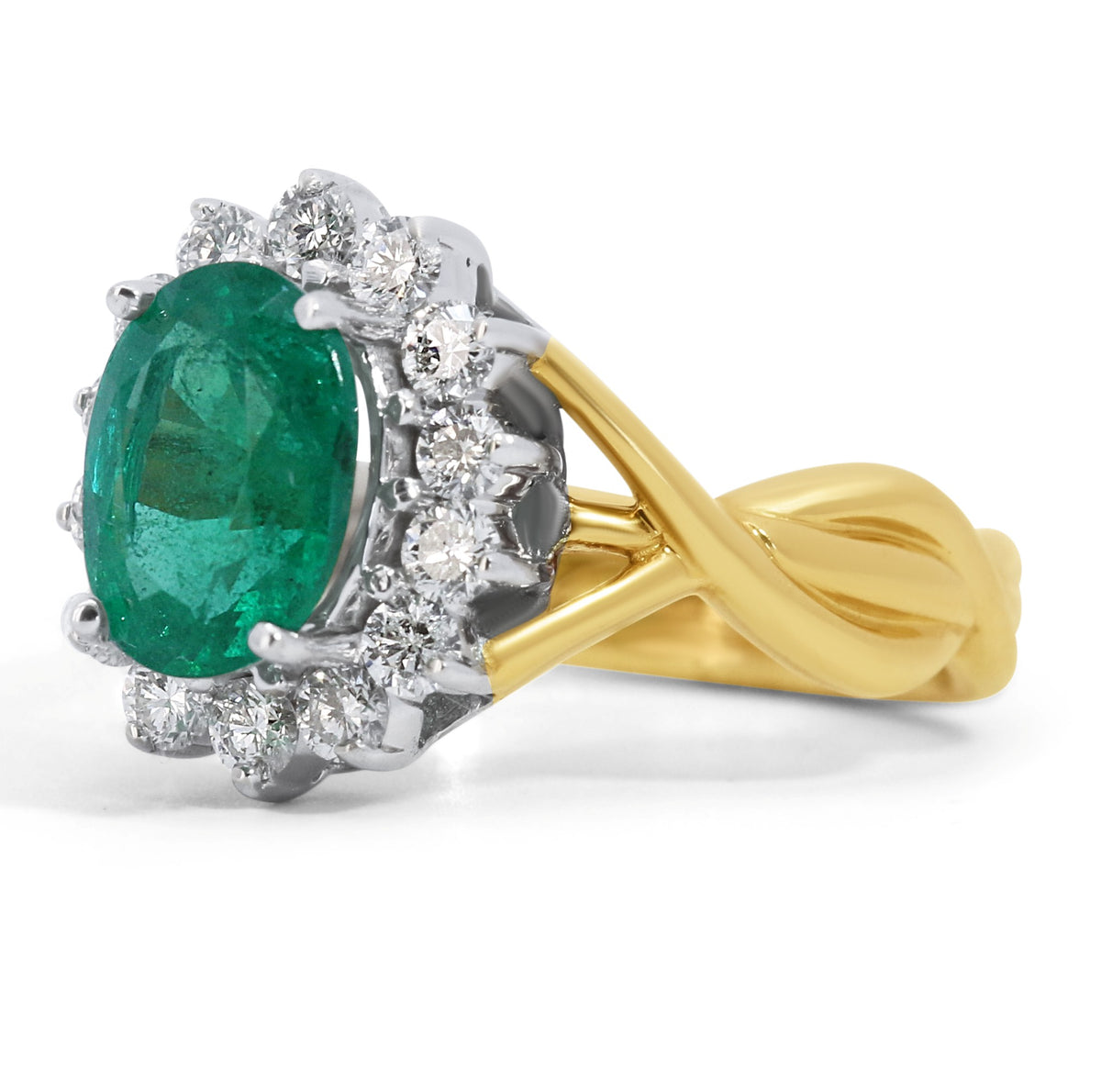 Oval Emerald & Diamond Halo Ring