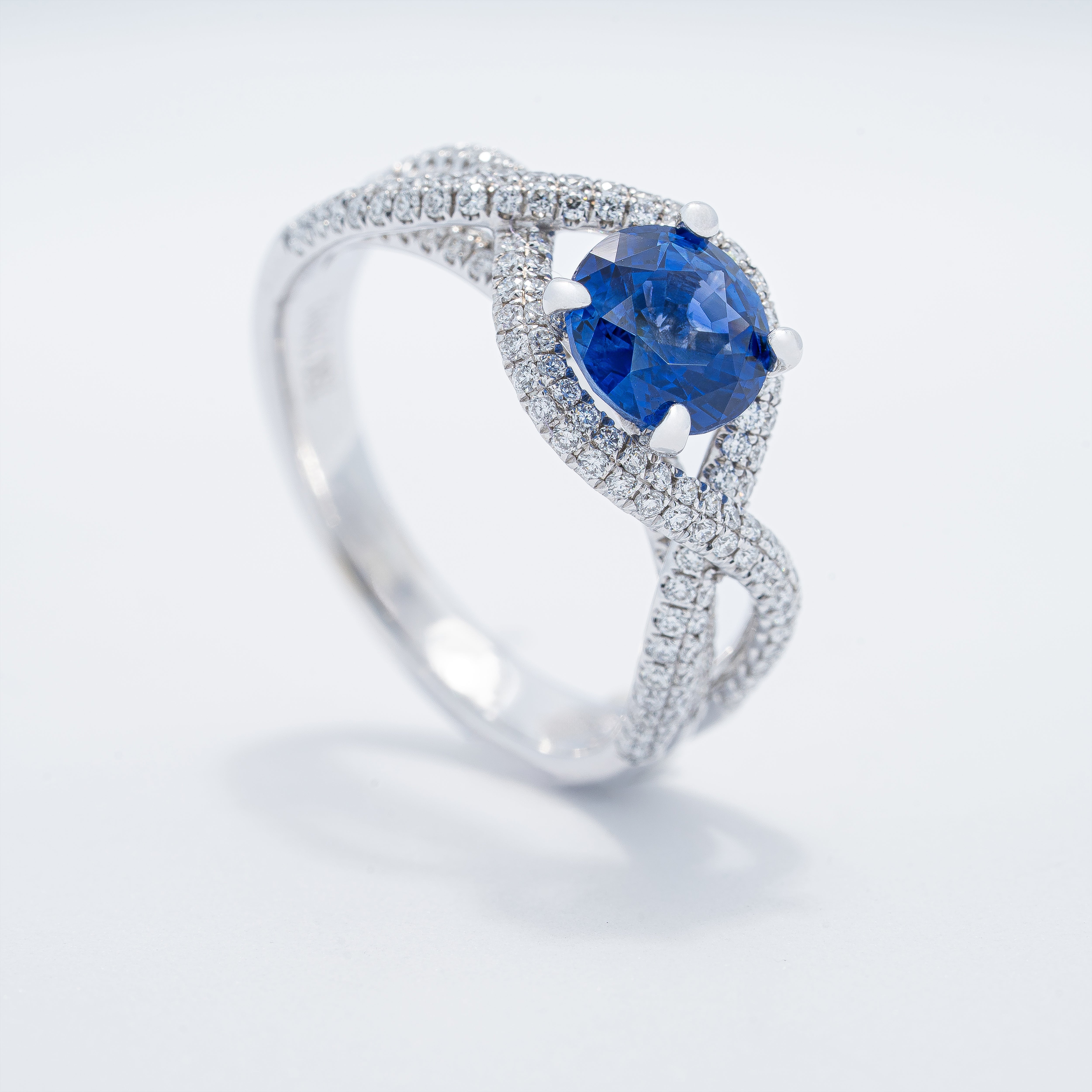 Modern Crossover Style Sapphire Ring