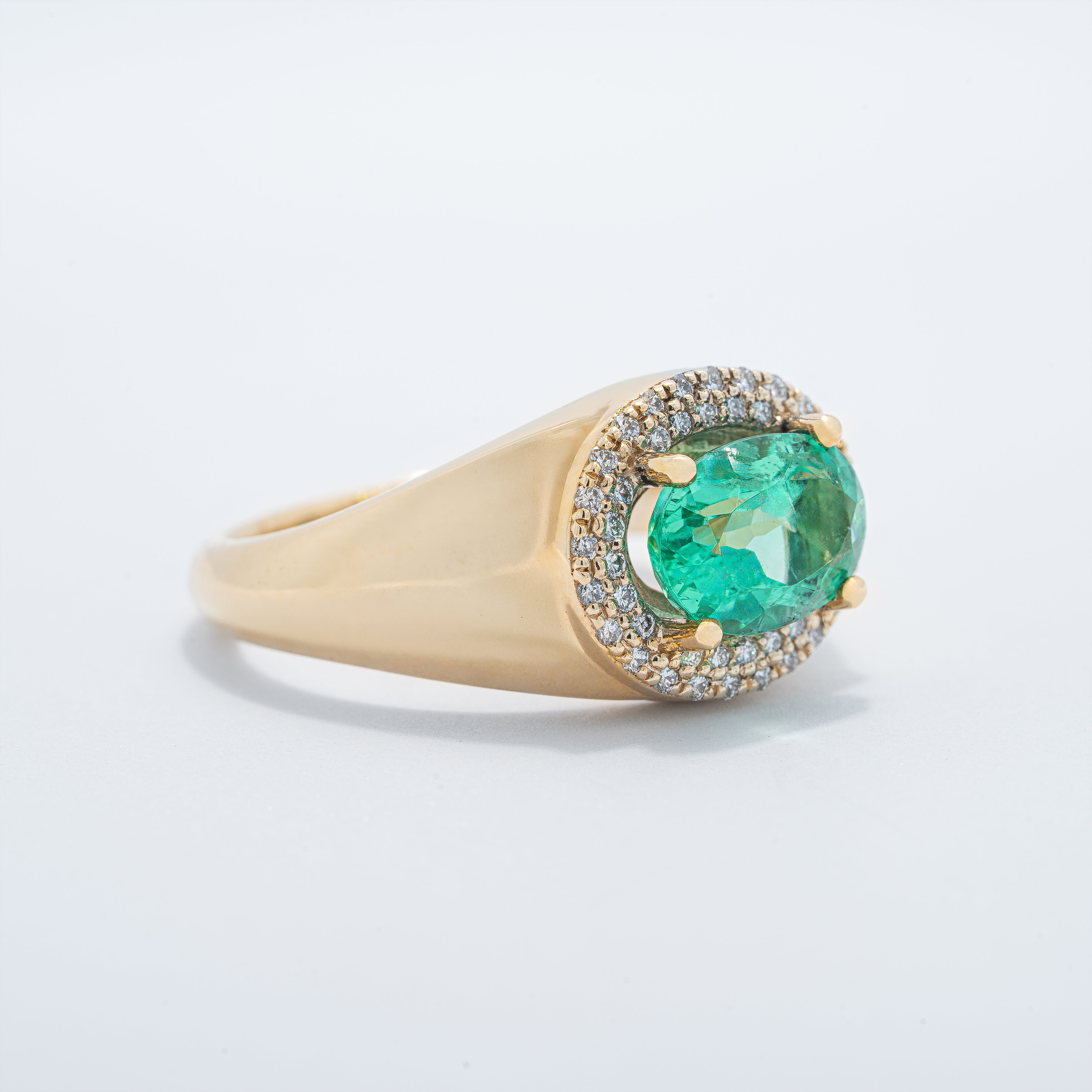 Oval Double Halo Emerald & Diamond Ring