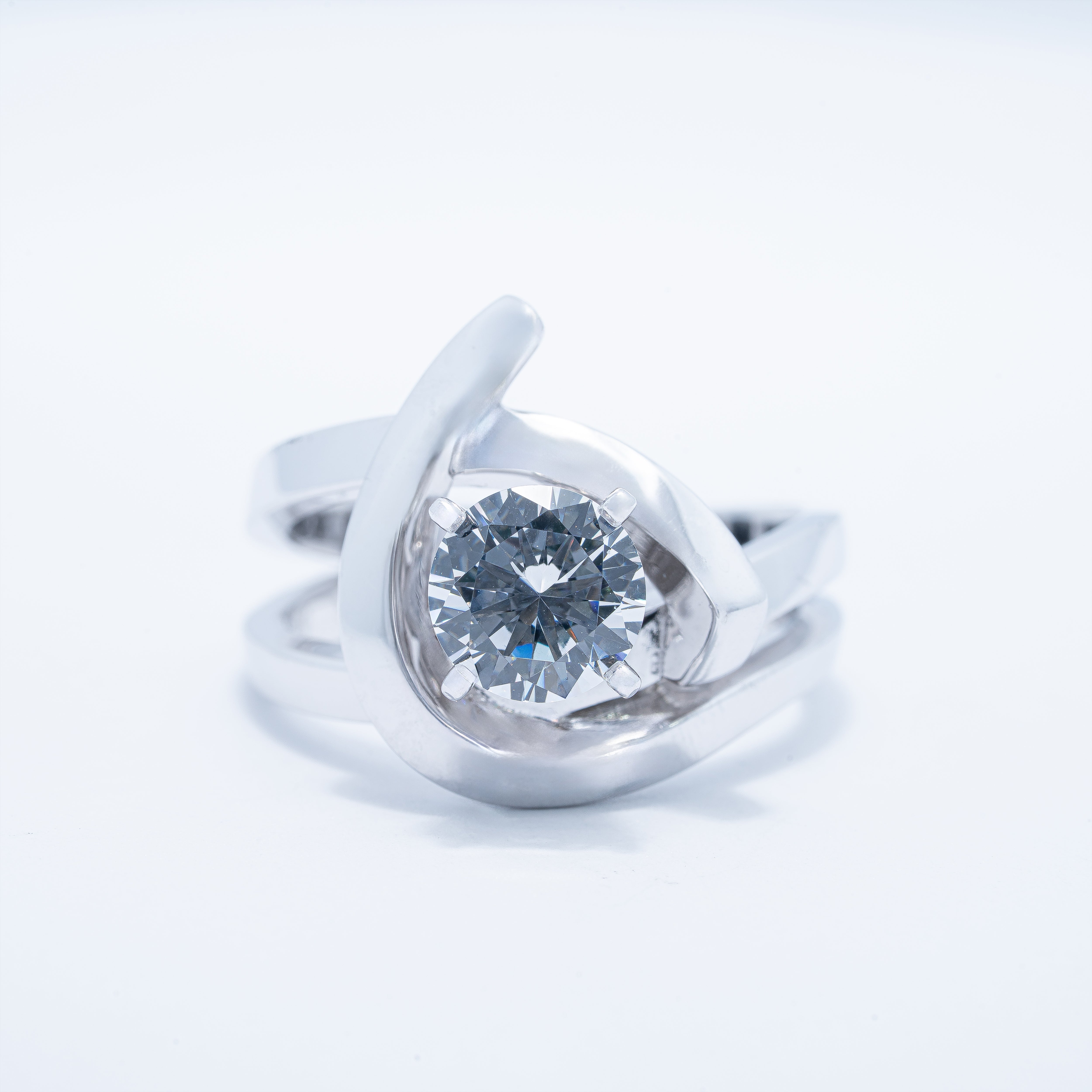 Modern Swirl Solitaire Engagement Ring