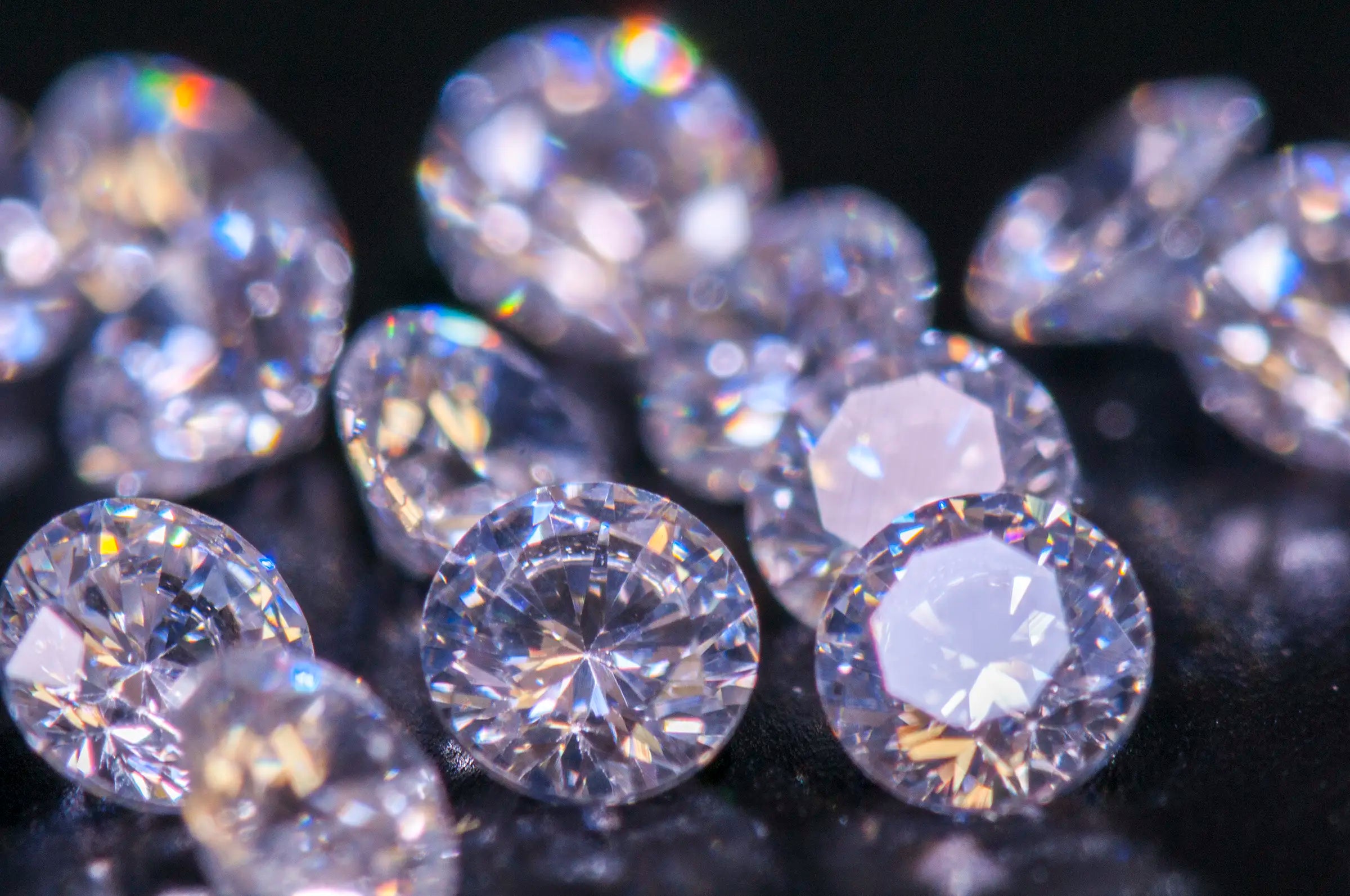 Multiple large diamonds laid out for display