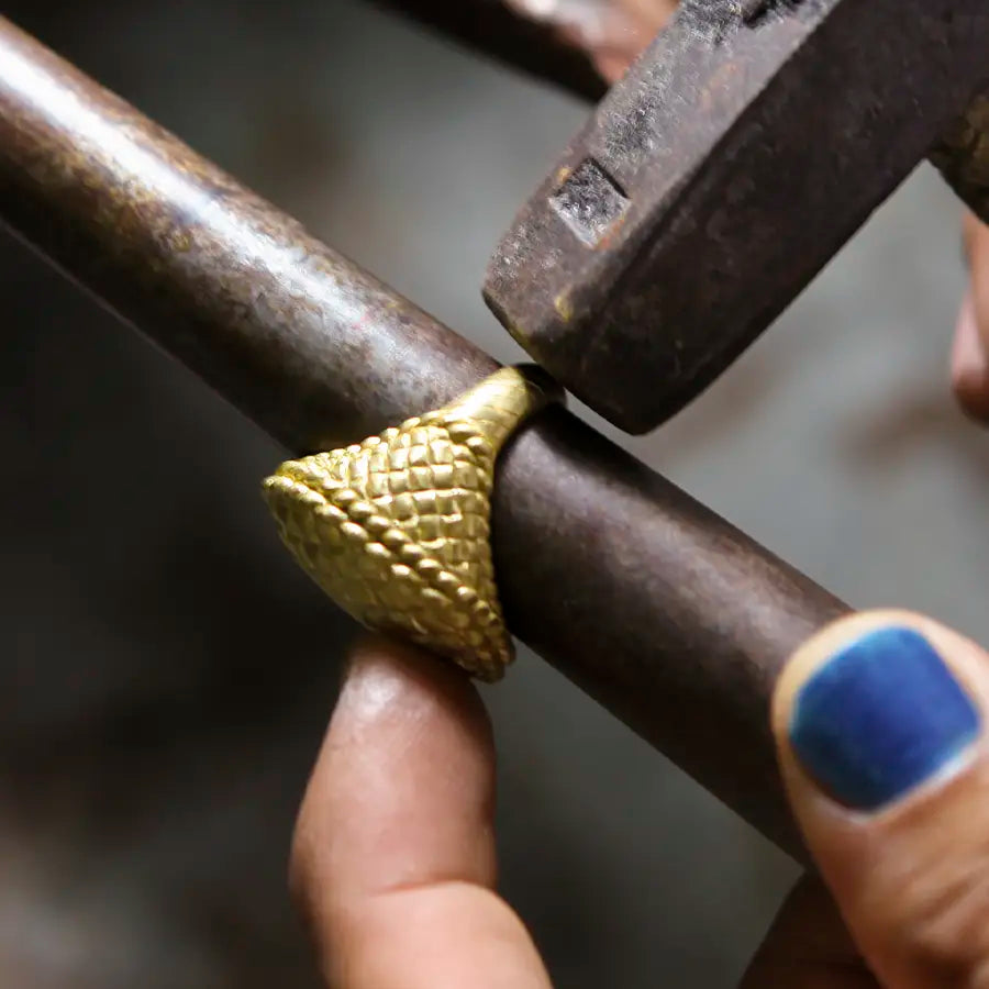 Jeweler resizing a ring using professional tools at Joe Kassab Jewelers in Happy Valley, Oregon