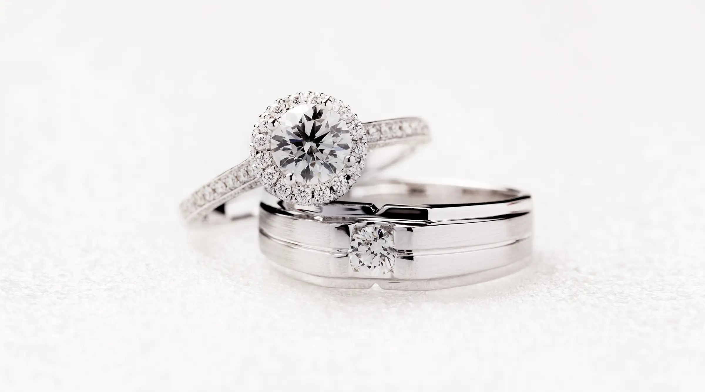 Pair of silver diamond rings covered by lifetime warranty at Joe Kassab Jewelers